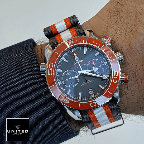 Omega Seamaster Planet Ocean 215.32.46.51.99.001 "Grey" Premium Duplicate Edition omega seamaster planet ocean 215.32.46.51.99.001 replica hand Omega Seamaster Orange Bezel Replica on the man wrist