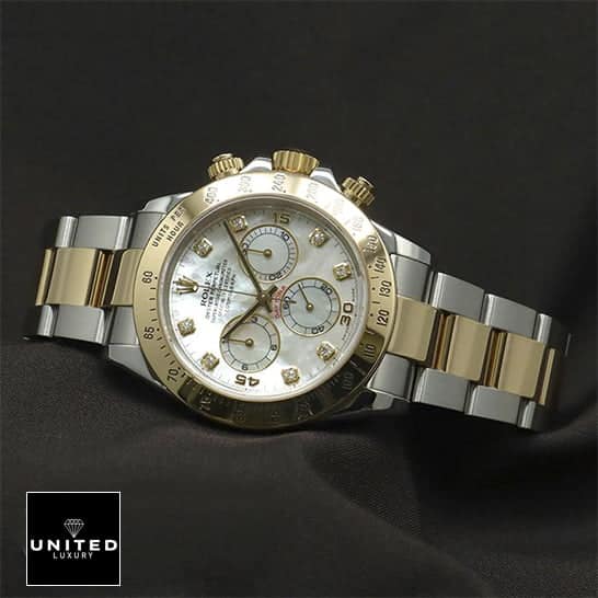 Rolex Daytona Two-Tone 116523 "White Dial" Authentic Super Replica rolex 116523 white dial replica Rolex Daytona Two Tone White Dial 116523 Replica on the black table