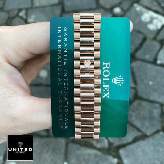 Rolex Day-Date President Rose Gold Roman Dial 118235F-0024 Ultra Fine Replica rolex day date 118235f 0024 replica oyster Rolex Day-Date President 118235f-0024 Oyster Bracelet on the Rolex logo & Warranty Card