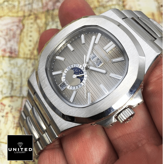 Patek Philippe Nautilus "Black Dial" 5726/1A-001 Swiss Super Clone patek philippe nautilus 5726 1A 001 Patek Philippe Natilus Grey Dial Moon Steel Replica on the hand map background