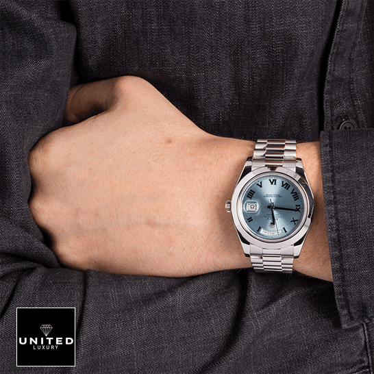 Rolex Datejust 126300 "Roman Numerals" Handcrafted Clone Quality Rolex Day-Date II Stainless Steel 218206 Oyster Replica on his arm