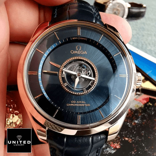 Omega Tourbillion Co Ax?al Blue Dial Replica on the hand