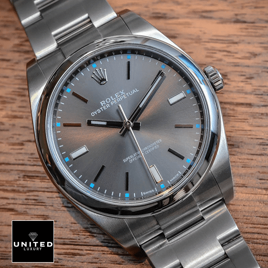 Rolex Oyster Perpetual 114300 "Steel Case" Super Clone Quality Rolex Datejust Perpetual 114300 Replica dial is a dark rhodium grey with luminescent hands and hour markers