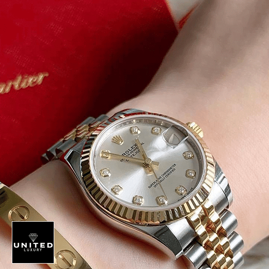 Rolex Lady-Datejust 279173 Silver Diamond Dial Deluxe Replica Edition Rolex Datejust Diamond Replica on a woman's wrist
