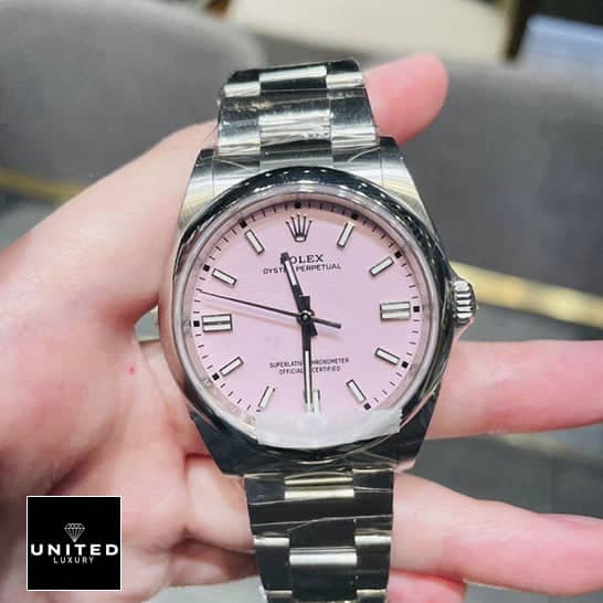 Rolex Oyster Perpetual 124300 "Candy Pink" Collector’s Clone 1:1 rolex oyster perpetual 126000 replica 2 Rolex Oyster Perpetual 124300 Oyster Replica on his hand